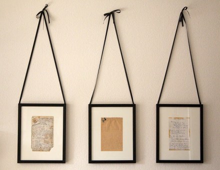 Scan Grandma's hand-written recipe cards, use thrift shop frames... and hang from black satin ribbons to show them for the gifts from your past that they are!